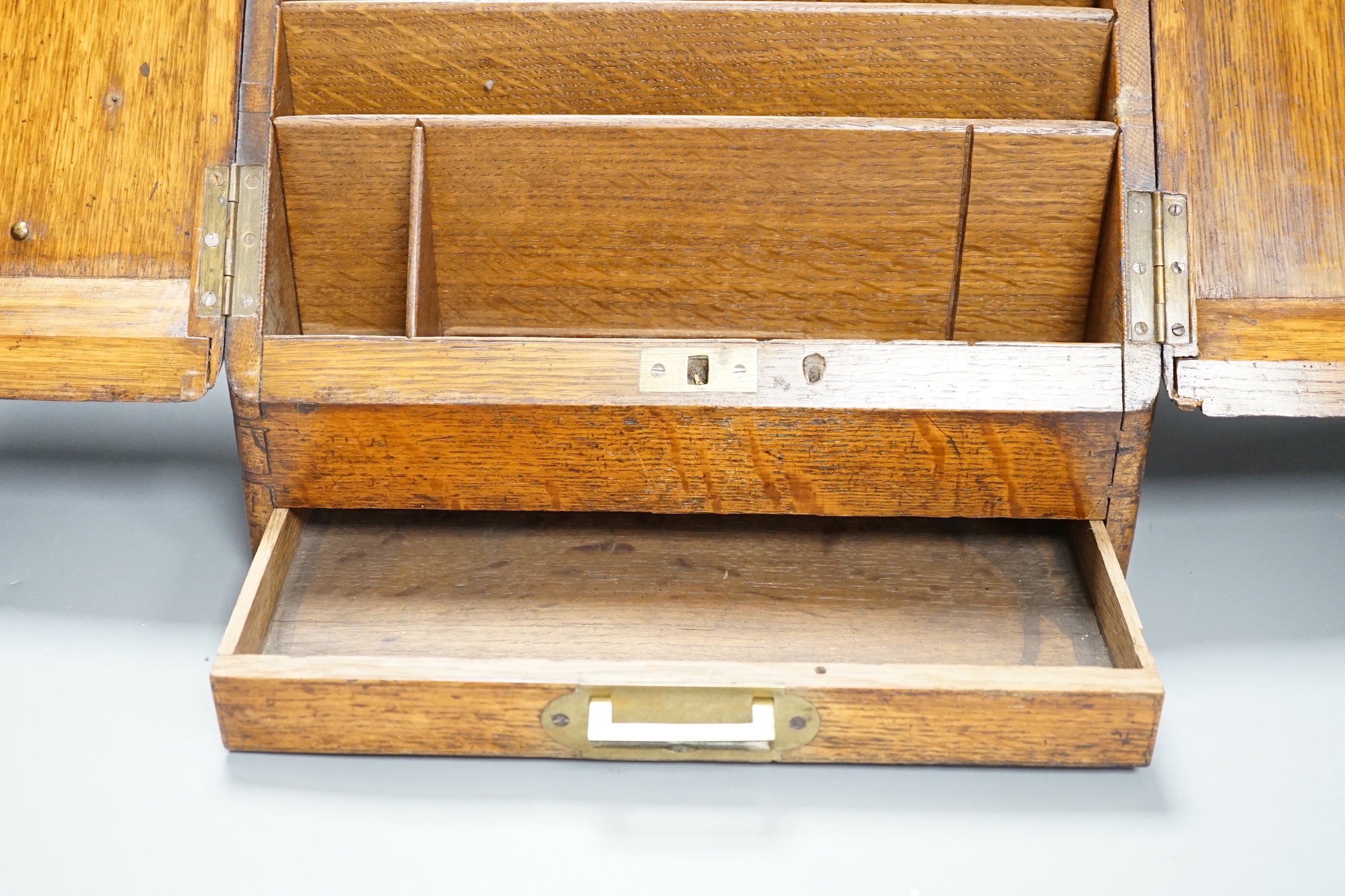 A Victorian oak stationery box with original fittings